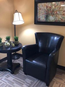 Chair with table and lamp