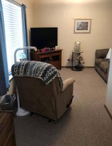 Living area with TV and recliner
